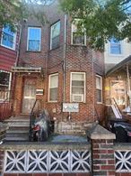 Two Family House Brick, 1st Floor: 2 Bedrooms, Living Room, Kitchen, Full Bathroom. 2nd Floor: 2 Bedrooms, Living Room, Kitchen, Full Bathroom.