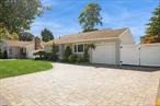 Welcome to this updated front-to-back split in Farmingdale. This home offers a great blend of modern features and comfortable living.The main level features an updated kitchen with granite countertops, stainless steel appliances, and gas cooking. Hardwood floors run throughout the main living areas, providing a consistent look and feel. The layout includes a dedicated area perfect for a home office, offering a quiet space for work or study. The updated bathroom features a Jacuzzi tub.This home has three bedrooms and one full bathroom, with a smart, functional layout. The attached garage with interior access adds convenience and security and is equipped with a 1450 hookup for an EV charger. The washer and dryer are included. Newer windows throughout and a new hot water tank contribute to the home&rsquo;s efficiency and a long lifespan.Outside, the spacious, flat, fenced-in backyard offers a private space for outdoor activities and entertaining. Financial and environmental benefits come with the solar panels, which help keep electric costs low. The property is located in the Woodward Parkway Elementary school area. This home is a must-see for anyone seeking a well-maintained, move-in ready residence.