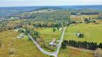 Welcome to 21.77 picturesque acres in the heart of Callicoon, NYâ€”an exceptional piece of residential ACG-zoned land offering a rare combination of privacy, accessibility, and breathtaking natural beauty. With three distinct entry points, this expansive parcel provides flexible access options and endless potential for your Catskills dream property.The land itself is a blend of gently rolling terrain, low-lying clearings, and higher elevation areas that level off to reveal sweeping mountain viewsâ€”perfect for siting a future home, guest cabins, or a private retreat. A serene stream meanders through the property, adding to the peaceful, untouched feel of the landscape. Whether you&rsquo;re looking to build a full-time residence, a weekend getaway, or explore sustainable homesteading or small-scale agricultural pursuits, this property offers the versatility to do it all.Zoned Residential ACG (Agricultural-Conservation-Residential), this land allows for a variety of uses including single-family homes, small farms, gardens, greenhouses, and accessory structures. The acreage offers more than enough room for privacy, creative design, and even potential subdivision with proper approvals.Located just minutes from the charming hamlet of Callicoon, youâ€™ll find a vibrant local community with a weekly farmers market, boutique shops, art galleries, and farm-to-table dining. Outdoor enthusiasts will enjoy nearby access to the Delaware River for kayaking, tubing, and fishing. Bethel Woods Center for the Artsâ€”site of the original Woodstock Festivalâ€”is just a short drive away, offering concerts, festivals, and cultural events year-round.Tax Map # 3.-1-3.1