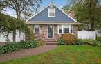 This classic cape in the desirable Idle Hour Community, has been lovingly cared for, with pride of ownership in every detail. From the inviting stonework and charming front masonry to the spotless interiors, the home blends timeless character with comfort. The roof and siding was replaced only 2 years ago. Enjoy the convenience of the primary bedroom on the 1st floor, a fireplace in the living room, a full basement, 2 full, updated bathrooms, 2 ductless air conditioning units, 2 zones of heat and a huge driveway. The yard is fully fenced and features an in-ground sprinkler system. The location provides easy access to major highways, shopping, restaurants, schools and parks.