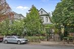 455 E. 28th Street â€“ A Victorian Gem with a Backyard OasisNestled on a tree-lined block of Victorian homes, this fully detached two-family 6-bedroom, 4-bath residence with a private driveway blends timeless elegance with modern versatility. Featured in several films, the home offers expansive living space with beautifully preserved details, historic charm, and sun-drenched rooms that create a warm, inviting atmosphere throughout. High ceilings and large windows enhance the sense of space, allowing natural charm to fill every room.The inviting wraparound porch opens to a gracious foyer with stained-glass windows, original woodwork, and inlaid parquet floors. The first floor living room flows into a bedroom and opens to a hall leading to another bedroom and eat-in kitchen, providing easy access to the outdoorsâ€”perfect for entertaining and seamless indoor-outdoor living. The second-floor classic-style wood-finished kitchen, complete with custom cabinetry and a pass-through bar, adds elegance and functionality.The sprawling backyard is a true showstopperâ€”paved for recreation with a basketball court, pickleball court, tree-swing, and lush bamboo plantings. This peaceful oasis is ideal for hosting gatherings, entertaining friends and family, or simply enjoying a quiet retreat from city life. Upstairs, the king-sized primary bedroom is complemented by an adjacent home office or study with outdoor terrace suitable for a coffee break. The third level includes two additional bedrooms and a separate room currently used as a walk-in closet, while the finished basement provides space for storage and/or a washer and dryer.Move-in ready yet offering endless opportunity to customize, this exceptional Victorian home is close to shopping, cafes, houses of worship, the 2/5 trains and B41 bus at the Junction.Additional amenities include a flexible layout ideal for multi-generational living or rental income, ample closet space throughout, and original architectural details that have been meticulously maintained. This exceptional residence offers both tranquility and convenience in one of Brooklyn&rsquo;s most sought-after neighborhoods. Schedule your private tour today and experience this one-of-a-kind Brooklyn oasis.