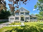 Nestled in the heart of Bellport Village, this exquisite 3 bedroom, 3.5 bath home offers the perfect blend of modern luxury and cozy comfort. Completely rebuilt in 2023/2024 this stunning home is located on a quiet cul de sac and perfect for those looking to enjoy serene village living just moments away from local shops, dining, and beautiful beaches. This home highlights an expansive open-concept and spacious living room with a gas fireplace and a formal dining area perfect for relaxing and entertaining. The heart of the home is the gorgeous new, chef inspired gourmet kitchen boasting Fisher & Paykel refrigerator, Miele oven, Bosch dishwasher and GE profile dual temperature wine refrigerator. The over sized central island and custom cabinetry finish off this spectacular setting where one will enjoy many memories. The first bedroom is a large, junior suite and is located on the first floor. This area boasts a huge closet and professionally designed bathroom with top of the line finishes. As you make your way up the oversized stairwell you will find the luxurious primary suite. This sun drenched area features a spectacular 17 X 18 foot sleeping area, bathroom with imported tile, slipper style bathtub with views of the pool and sophisticated glass paneled shower and large custom closet with built in shelving and drawers. The additional guest bedroom has Jack and Jill access to the full bath and is located directly across from the office/nursey. The oversized laundry room is upstairs for ultimate convenience. As you make your way outside you will find the composite board deck overlooking an inground gunite swimming pool, ideal for summer entertaining. The hand dipped cedar shingle give the quintessential, classic Bellport Village vibe. Other features include a one car garage, full basement, hardwood floors throughout, inground sprinkler system, fully fenced yard and so much more. All Village amenities included.