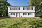Large Colonial on .94 Acre built in 1976 and added onto in 1987 with second floor. Features large Living Room, Dining Area, Kitchen, Den, Two Bedrooms, One Bathroom on First Floor.  Second Floor has Four Generous Sized Bedrooms, One Bathroom. Attached 1.5 Garage, Patio, Second Floor Sundeck. The Land is level and mostly cleared & fenced. Loads of storage. The large rear yard is perimeter fenced 4&rsquo; chain link.