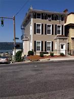 Yonkers water front redevelopment opportunity...........or use as an investment money making 4 family with detached oversized garage....walking to Yonkers Metro North and water front......Apts are rented below market rent and have no leases. The 1 bedroom is vacant market rent is $1800.