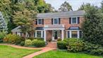 Traditionally elegant brick, 4 bedroom, 3.5 bath center hall Georgian colonial located in the much sought after enclave of Wincoma in Huntington Bay. This charming home is beautifully set on a flat half acre of landscaped property with close proximity to the private Wincoma beach and a short distance to the association dock. The gracious foyer with its sweeping staircase provides the loveliest preview of the character and style that abounds throughout this very special residence! Entry hall features two closets, tiled flooring, convenient half bath and access to the living room and dining room on either side. The sunken formal living room, perfect for entertaining, is light and bright with a large bay window. The formal dining room is generously sized to accommodate all your guests. The fabulously outfitted chefâ€™s kitchen is updated with Woodmode cabinetry, granite countertops and high-end appliances including; Wolf gas stovetop, Subzero fridge, Dacor oven and Bosch dishwasher. Peninsula seating, a dining area, tile flooring with radiant heat, warming drawer, ice maker and wine fridge are additional attractive and functional features. Sliders in the kitchen provide access to the private backyard. Next to the kitchen, the large mudroom offers amazing custom built-in storage organizer and entry to the two-car garage, along with an updated full bathroom with shower stall. Off the kitchen, an inviting den area with custom built-in cabinetry, detailed millwork and French doors that open to the brick patio. This space also features an additional sunken living area anchored by a wood burning fireplace and a second set of interior French doors leading to the living room. Upstairs; four spacious bedrooms all with ample closet space. The well-appointed primary suite offers a double closet, a large custom walk-in closet and updated full bath with double sink vanity, jetted tub and steam shower. Three additional bedrooms equipped with custom closet systems and a hall full bathroom offers tub shower and double sink vanity complete the second floor. The full basement provides wonderful additional space with endless possibilities and offers a separate laundry room, storage and utilities. A picture perfect private fenced yard and brick patio awaits for al fresco relaxation and entertaining. Wincoma private beach just down the street is yours to enjoy year-round - swim, play and participate in association social events on the waterfront! Additional features of this home include; 10 zone in ground sprinklers, updated Andersen windows, 2 zone central air conditioning, 3 zone heat, high efficiency oil burner, indoor/outdoor speaker system, separate hot water heater, automatic turn on gas generator, updated cesspool, 150 amp electric, updated roof and gutters, updated fencing, driveway and stacked stonework. Wonderful opportunity to live in the Incorporated Village of Huntington Bay, which includes a town hall and separate police department, in addition to being a few miles away from Huntington Village and the Long Island Railroad. Welcome home!