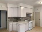 Location, Location, Location. Right across the park, right off the A train Station, near Police Station, shoppings, transportations, worships, all commericals, this unique Junior 4 apartment features 1 lg bedroom, 1 junior bedroom, open layout LR/DR/KIT, every room has storage is the back apartment on 2nd floor of a mix-use building, newer kitchen, newer paint, waterproof vynle plank floor through out, granite kitchen counter-top.