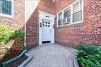 First Floor unit with a Terrace.....This Brick building has just had it hallways renovated, added a community Room, Free storage, Garage parking available for $100/month, Washer/Dryer in unit plus a Large Laundry Room in the Basement, This unit is extra large with a separate dining room (Window, custom blinds & a closet) it can easily be made into a 3rd Bedroom or Den, 2 Full bathrooms (one with a tub and the other with a stall shower), Eat-in kitchen with a window and 2 dishwashers, Hardwood Floors, 2 closets in the foyer/Entry (one is a walk-in-closet), Spacious Terrace, Super on premises, Backyard lounging area with table, benches, basket ball and a beautiful garden.