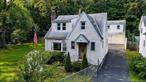Welcome to 8 Crescent Hill Dr. This charming Cape Cod offers the perfect blend of convenience and comfort. Ideally located just minutes from major highways and shopping, yet tucked away in a quiet quaint neighborhood with your own peach tree in the front yard. It provides the best of both worlds. With a welcoming front entry, you will find cozy living spaces filled with character and potential, ready to make your own. The detached two car garage with overhead storage can be another great space for storage or your own workshop. Whether you&rsquo;re looking for a peaceful retreat or easy access to everyday amenities this home delivers it all.