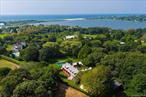 An Iconic Georgica Experience â€“ Set on the grounds of a beloved former milk farmâ€”where generations of locals once stopped for fresh milkâ€”this rare Hamptons property embodies the soulful lifestyle of Georgica, blending rich history with modern sophistication and international design accents. Just moments from Georgica Beach and Georgica Pond, the residence is a truly one-of-a-kind destination. The reimagined barn architecture on nearly two acres set amongst bucolic properties is both iconic and intimate, merging rustic character with refined elegance. From the moment you step through the siloâ€™s front door, greeted by the sound of a cascading waterfall, a sense of wellness and retreat envelops you. Indoor and outdoor pools, private outdoor showers, and serene lounging spaces invite unforgettable summers and year-round relaxation, and understated indulgence. Entertain with ease and styleâ€”whether hosting a quintessential Hamptons lobster bake at dusk or savoring cocktails on the second-floor decks with views of the rolling property and its magnificent specimen trees and beyond. After a sun-drenched day at the ocean, return home to rinse off under either the pool side outdoor shower or the primary ensuite&rsquo;s outdoor Silo shower and share unforgettable moments with family and friends in complete privacy. This property is more than a homeâ€”it is the perfect Hamptons setting to make memories: a serene experience, a timeless retreat, and a celebration of Hamptons living in coveted Georgica just moments to the center of East Hampton Village and all it has to offer. Multiple indoor living areas with elegance and warmth provide relaxation and gathering opportunities depending on the mood, season, and the time of day. The Primary Ensuite offers french doors to a private balcony escape overlooking notable property views. Four Bedrooms; four and a half baths, two living rooms, multiple private balconies, an indoor and outdoor pool await the ebbs of flow of quintessential summering in the Hamptons, and the beauty and energy of each season in this truly special place. Available Summer months and monthly throughout the year. January: $68, 000 February:$68, 000March:  $68, 000April:  $68, 000May: $115, 000 (which means 85 % of the high season price)June: $115, 000 July $135, 000August $135, 000August - Labor Day $150.000   September $135, 000October :  $68, 000November:  $ 68, 000December: $100, 000