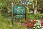 Welcome to Scarsdale Woods in Edgemont --a serene community with landscaped grounds, lush green lawns, and walkways. There is a community pool and plenty of green space to enjoy outdoor activity.Enjoy the best of both worlds: a private, park-like atmosphere with the convenience of walking distance to schools and easy access to local amenities. Edgemont School District -- walk to Edgemont Junior Senior High School. Walk to restaurants and shops jor hop on a train or bus to NYC.This two BR 1.1 Bath unit is located one flight up from both north and south entry doors. Featuring an eat in kitchen, stainless steel appliances including new stainless steel washer dryer. A sweet balcony off the living room offers outdoor dining or relaxing. Newer A/C units and ceiling fans. Walk in closet and custom closets in primary bedroom. Storage space in basement!A perfect blend of nature and convenience-- and located just steps from the Greenburgh Nature Center, this home provides peaceful living while remaining close to everything you need.