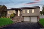 Sprawling Ranch/ Raised Ranch in Smithtown School District * Central A/C * Wood Flooring * Spacious Rooms (See Floor Plans) * Vaulted Ceilings * 2 Car Garage * In-ground Pool (Pool Hasn&rsquo;t Been Opened in 3 Years) * Low Taxes * 2763 Square Feet (Includes Lower Level)