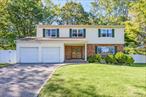Beautifully Updated Colonial in Dix Hills.This spacious 4-bedroom home features an inviting entrance foyer, bright living room, formal dining area, and a large eat-in kitchen that opens to a beautiful backyardâ€”perfect for entertaining. The cozy family room with fireplace offers warmth and charm, while hardwood floors throughout add timeless elegance. Upstairs, generous bedrooms include a primary suite with walk-in closet and treetop views. The finished basement provides flexible space for a gym, playroom, or office, and the two-car garage offers plenty of storage. Enjoy a private fenced backyard with pergola, large deck, and lounge area ideal for gatherings. Conveniently located near the LIE, Northern State Parkway, shops, and restaurants. This home truly combines comfort, style, and convenienceâ€”a must-see!