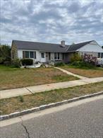 Come to see a home to really invest in. A 3 bedroom-1 and half bath ranch, eat in Kitchen -fireplace in the living room, laundry room, all nestled on a large 100x140 lot. Enjoy the convenience of close proximity to parks and access to well renowned Massapequa school District #23. This home is spacious and needs some TLC. Come make it your own.