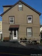 Spacious 2 Bedroom unit with large kitchen open to the dining room. Enter to a den/office or the to the Living Room. Continue to a bedroom, while the open kitchen and dining room lead to the 2nd bedroom. Full access to insulated walk-up attic. Washer/ Dryer and extra toilet are in the basement. Close to train. Landlord pays for heat and water. Tenant pays for electric and gas. Parking per car @$150/month.