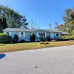 Lovely Co-Op community at the sought-after Hidden Brook Estates! This spacious 28â€™x60â€™ (1, 680 sq. ft.) Holiday Homes manufactured home, built in 1985 by the communityâ€™s developer, offers 2 bedrooms, 2 baths, and a family room. Enjoy vaulted ceilings, an open floor plan, and great natural light. The kitchen features a center island with a new glass cooktop, and the dining room includes two built-in lighted corner cupboards and wood flooring. The family room offers built-in cabinetry and wood floors. The primary suite includes an oversized bath and two walk-in closets. Many updates: new architectural roof (Sept 2025), Navien on demand gas furnace (2021), hot water heater (2017) many replacement windows and new washer & dryer. Carport for 2 cars, large shed with electric, 200-amp service, and private yard with garden views. Original Central air still works! Pride of ownership showsâ€”beautiful landscaping by a master gardener. Lot rent $500/month includes taxes, water, sewer, garbage, and snow removal for main roads. Co-op Board approval required. Estate sale â€“ sold as-is. Cash or mobile home financing only. Home inspection for information purpose. Prospective Buyer must submit Hidden Brook Estates residency application for Co-op Board for approval before contracts will go out. Why pay rent when you can own? This home spells â€˜Home Sweet Home!â€™ Come and take a look. Use ST app for appts.
