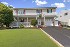 Yearning for your coastal community dream home a block away from Great South Bay? This ready-to-move in hi-ranch home with over-sized entry foyer is located in Lighthouse Point, Village of Lindenhurst. The 2nd level floor plan boasts hardwood flooring, ceramic tile and crown moldings throughout. Custom Anderson windows and skylights highlight natural light in every room. The recently added 16 X 20 outdoor deck only adds to the experience. New main bath in 2024, new roof in 2023, new CAC in 2022. Main level includes cozy den with fireplace, bedroom and full bath. Access to laundry, garage and utilities. Potential for mother/daughter by permit with outside separate entrance. Great pet friendly neighborhood! Minutes from the downtown bustling village, this corner lot home offers close access to Shore Road Park recently renovated, complete with a child&rsquo;s playground and athletic fields on the Bay, along with The Town Marina and waterfront restaurants. Don&rsquo;t miss this opportunity!