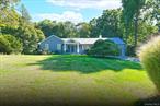 Welcome to 42 Flower Hill Road! This beautifully expanded and very recently renovated sprawling ranch features a stunning kitchen with abundant cabinetry, stainless steel appliances, quartz countertops, a spacious center island and walk in pantry, soaring ceilings with skylights fill the home with natural light and flow seamlessly into the family room with butler&rsquo;s pantry with wine refrigerator, the formal dining room with pretty light fixture and formal living room with a wood-burning fireplace, both offer elegant spaces for entering. The primary bedroom offers a new ensuite bathroom with chevron tile and soaking tub and walk-in closet, accompanied by two additional bedrooms and new guest bathroom, gorgeous hardwood flooring throughout, the enormous unfinished basement provides endless possibilities. Additional highlights include a new gas conversion, a large attic with flooring for added storage, a two-car garage, a pretty and private flat acre, lovely curb appeal with blue stone porch, and a fantastic location.