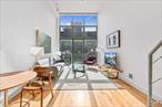 Spacious and sun-filled! This loft-style duplex offers soaring 14-foot ceilings, dramatic light from a full glass fa&#231;ade, and incredible flexibility with two bedrooms, two full bathrooms, plus a lofted home office. Perfectly positioned just off Bedford Avenue, itâ€™s only minutes from Manhattan while surrounded by Williamsburgâ€™s best restaurants, caf&#233;s, boutiques, and waterfront parks.The main level opens to an expansive living and dining area framed by floor-to-ceiling windows. The open kitchen features GE Profile stainless steel appliances, granite countertops, and bar seating for casual dining. A large first-floor bedroom and full bath provide comfort and privacy. Upstairs, youâ€™ll find a second bedroom with a custom glass wall, another full bath with sleek finishes, and a bright lofted office overlooking the living space below.Hardwood floors throughout, in-unit washer/dryer, central air, and generous closet space complete the home.171 North 7th is a boutique condominium with a landscaped roof deck offering sweeping Manhattan views and a BBQ grill â€” the perfect setting for summer evenings. Low common charges and favorable taxes add to the appeal, making this both a beautiful place to live and a smart investment.Located in the heart of Williamsburg, 171 North 7th puts you moments from some of the neighborhoodâ€™s most loved spotsâ€”Devoci&#243;n, Sunday in Brooklyn, Caf&#233; Mogador, Maison Premiere, Lilia, and Joeâ€™s Pizza, just to name a few. The East River waterfront and Domino Park are close by for weekend strolls, and Whole Foods, Equinox, and the Apple Store are all within a few blocks. With the Bedford Avenue L train right around the corner, commuting to Manhattan couldnâ€™t be easier.A rare blend of volume, light, and location, Apartment 3B captures the best of Williamsburg living. Contact the listing agent to schedule a private showing.
