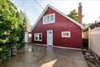 Location, location, location! Fully renovated rear detached Cottage offers privacy and two parking spaces. A unique opportunity.