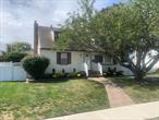 Midblock quiet location. The whole house is freshly painted. New carpet installed upstairs. Oak floors throughout the first floor. Updated kitchen. Formal dining with sliding doors leading out to a new Trex deck. Beautiful back yard. Inground sprinklers.