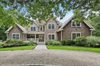 Welcome to luxury on the North Fork. This quality built home is located only 3 properties away from the popular Goose Creek Beach! Everything you need is here. There is plenty of parking and easy access entering and exiting the home with the horseshoe driveway and 2 car garage. As you enter the home you are greeted with high ceilings and an open floor plan. As you stand in the kitchen you can look at the fireplace in your living room, see your guests in the dining room or look out at your backyard oasis complete with in ground pool, beautiful lush gardens and a basketball court. On the first floor you have a primary en suite and second bedroom en suite, a laundry room and a half bath. On the second floor there is a third bedroom en suite along with 2 additional bedrooms, a full bathroom and a loft area used as an office. Relax in one of your outdoor settings, on the front porch or the private back deck. This elegant home will be you North Fork sanctuary for years to come.