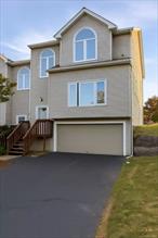 Well-maintained home in Highland Mills featuring a spacious layout with bright living areas, a large eat in kitchen, and comfortable bedrooms. Brand new carpeting throughout. Large windows bring in plenty of natural light, creating a warm and inviting feel throughout. Enjoy a private deck and peaceful setting just minutes from Woodbury Commons, Route 32, and the NYS Thruway.The kitchen offers plenty of cabinet and counter space, perfect for cooking and entertaining. Bedrooms are generously sized with ample closet storage. The home also includes central air, updated appliances, in-unit laundry, and both private driveway and garage parking for convenience.Outdoor space is ideal for relaxing or entertaining.