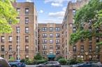 Beautiful Spacious 920 sq. ft. 1-bedroom apartment with extra office located in the heart of Jackson Heights. Landmark building Eat in kitchen . High ceilings and hardwood floors . Laundry in bldg. Live in super .