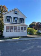 Village of Wappingers 3 bedroom 1.5 bath Colonial home. Living room and dining room with beautiful wood work and hardwood flooring, kitchen, half bath, laundry 3 season room and covered front porch complete the main level, Lots of storage on second level with main bath and 3 bedrooms. Full walkup attic is waiting to be finished. Fabulous location within walking distance to restaurants, bars, theatre, wellness spas and boutiques. Convenient to RT 9, close to shopping, churches, library, Beacon-Newburg bridge