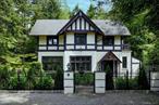 A modern renovated, historic 4-bedroom Tudor cottage within the gated Village of Tuxedo Park NY. The home is set on an oversized level yard with mature trees, picturesque boulders, bushes, plantings and 2023 refreshed classic French garden with plantings and a tiered fountain at the entrance of the home. The home offers over 2, 600 sq. ft. in a bucolic park-like setting, set back from the road. Inside the home, you find 11ft ceilings on the first floor, countless original architectural details, including hardware, doors and windows. The open floor plan includes a spacious living room with very large windows that allow so much light, and a wood burning fireplace, a casual dining area, and a chef&rsquo;s kitchen. Side doors leading to two beautiful entertaining patios and a side lawn. The primary bedroom has an en suite bathroom and four closets. Two additional bedrooms share a hall bath. There are ample closets and storage and laundry room on second floor. A fourth bedroom on third floor has its foyer and full bathroom. Central Air Conditioning throughout second floor. Full unfinished basement and a walk-in attic allows for ample storage. Driveway able to hold 4+ cars. ***Available for sale or rent. Please inquire.***