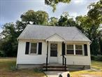 Adorable freshly painted 3 bedroom 1 bath home . Eat in kitchen. Livingroom. Large yard .