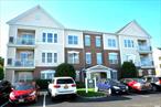Step into luxury and comfort in this Redwood model top-floor condominium nestled in the sought-after Courthouse Commons community. With 2 bedrooms and 2 full baths, this unit is ideal for those seeking refined low-maintenance living without compromising on elegance or amenities. Spacious 2-bedroom, 2-bath layout designed for both entertaining and relaxation, Top-floor (3rd) unit, offering privacy and elevated views. Private balcony overlooking a calming fountain water feature and landscaped courtyard. Includes a dedicated storage locker conveniently located on the first floorSecure building entry with magnetic key access and elevator service, and a pet-friendly community! Donâ€™t miss your chance to own a refined, amenity-rich condo in one of Central Islipâ€™s premier communities!