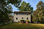 This handsome, well-maintained 3 bedroom saltbox is set on 4.5 acres of property to explore and enjoy. The backyard gently slopes away from the house -- open, grassy and shaded by a beautiful mature oak. Further down, beyond the backdrop of trees, is the entrance to a pathway that winds through the wooded part of the property, running past a small pond, along an old rock wall, and over a seasonal creek. Camping on your own property is fun in this woodland paradise. Closer to the house, the little kitchen garden holds flowers, herbs, and veggies to bring inside. The front entry porch is enclosed and used for a mudroom. Off the downstairs hall there&rsquo;s a coat closet, a bedroom, the kitchen and half-bathroom, and a living/dining area that is open to the second floor above. Upstairs there are two bedrooms and a shared full bathroom between them. The aesthetic is clean, simple and homey, with laminate flooring and pine trim throughout. The basement is large and dry, used for laundry, a workshop, and storage, including a separate root cellar. A woodstove in the basement provides lots of warmth that naturally rises throughout the house in the colder months. At the top of the basement stairs, is a door to the brightly painted covered side porch, which faces west. Just a 5 minute drive to the shops and restaurants of Main Street New Paltz for all the necessities. Call to book a showing today!