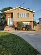 Well-Maintained High Ranch Investors Delight (Duplex) All updated Legal 2 by CO (Business E Zone) (5 Bedrooms, 3 Full bathrooms, 2 Kitchens) Newer roof, Siding, Windows, Newer Heating system 2019, 2 separate gas boilers, with separate gas and Electric Meters. 1ST Floor-Apartment 2 Huge Bedrooms, Eat in Kitchen, Large LR/DR combo, full bath with bathtub. 2 car driveway and a SIDE YARD. 2nd Floor Apartment=3 Bedrooms LR/ D/R full bath w/tub. Full bathroom with a shower stall. Primary bedroom with a Deck. Huge yard w/ tool shed. Brand-new cement 4 car driveway. Near all Transportation, train station, Down town, Stores, bakeries, Dry cleaners and restaurants. This Home has many possibilities.