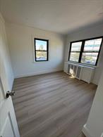 Just renovated, sun-filled, bright and airy 2-bedroom, 1-bath apartment on the 2nd floor with private entrance. Features a brand-new bathroom with standing shower, new kitchen with stainless steel appliances and marble countertop, open living area, and separate dining space. Includes two spacious bedrooms plus a bonus room ideal for nursery or office. All utilitiesâ€”heat, cooking gas, water, sewer, and trashâ€”are included! Available immediately.