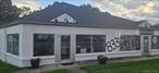This property is situated in a prime location on Old Country Road with excellent street visibility. It is in a high-traffic area, making it ideal for a wide variety of business uses, including food and retail establishments. Additional features include propane heating and access to sewers. The property is offered as a triple net lease.