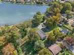 Charming cape with water views on quiet street with boat launch! A total dream! House was recently renovated both inside and out. The recently painted rich, navy blue siding pops as you pull up alongside the newly built stone wall to welcome family and friends. The interior has been updated with new paint and flooring. Neutral colors and touches of shiplap throughout make the whole home very cohesive. A vaulted kitchen ceiling with exposed beams add a touch of whimsy to this great space. Newer appliances, cabinets, and granite counters will have you inspired to cook or enjoy your morning coffee. Full bathroom and a bedroom located on the main level is a bonus that allows flexibility. Upstairs master with multiple closets and a discrete half bath with plenty of room to add a shower stall. Laundry hookups located in the walk-out basement that could double as your workout space. Water views from the gazebo and space to grill on the deck. Plenty of parking in the newly paved driveway for your cars and kayaks. Located just minutes to downtown shopping, Garnet hospital, the train station, Route 17 and I-84, Galleria Mall, movies, gyms, food, grocery stores, and more. This house really does have it all!