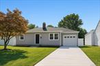 Completely Renovated Ranch Under 2025 Building permit.New Windows, Siding, Roof.  3bedroom 2 bathrooms. Open layout kitchen. White Shaker cabinets with SS Appliances. New 200 amp electrical. Solid oak Floors.Finished Basement with Separate entrance and full bathroom. Lots of storage space. Located on a quiet treelined street . Walking distance to parks. Large Fenced in PVC backyard.