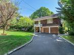 Welcome to your dream Home in Manhasset. Perfectly situated in a quiet, tree-lined neighborhood just moments from town and train, this beautifully updated residence offers the perfect blend of timeless elegance and modern convenience. Featuring 4 generously sized bedrooms and 2.5 baths. The inviting foyer welcomes you to the main level, leading to a state-of-the-art designer kitchen with center island, quartz countertops, and high-end appliances. The open flow connects seamlessly to the formal dining room and bright family room with sliding doors to a beautiful backyard. The living room offers a warm and airy space with a vaulted ceiling and skylight, creating a naturally bright and welcoming atmosphere. Additionally, you will find a powder room and a convenient laundry room on the first floor. Upstairs the primary suite offers a large walk-in closet and a luxurious new en-suite bath. Three additional bedrooms and hall bath complete the second level. The basement provides utility space and storage, while an attached garage & mud room adds everyday convenience. Additional features include Gas heat & CAC. Gleaming hardwood floors, and sprinkler system. Spacious, stylish, and ideally located, this home is designed for todayâ€™s lifestyle.