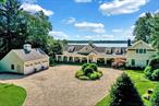 Introducing 111 Old Field Road, Setauket a truly exceptional waterfront estate offering 177 feet of uninterrupted shoreline and panoramic views of Conscience Bay. Tucked away behind a long private drive, this majestic home sits gracefully back from the road, delivering the ultimate in privacy and elegance. The approach is breathtaking, and the beautifully landscaped grounds set the tone for what awaits. A three-car detached garage provides ample space for your vehicles, water toys, or collectorâ€™s items, while the backyard is a serene sanctuary featuring an in-ground pool overlooking the tranquil bay, a outdoor kitchen, and a pergola perfect for relaxing or entertaining. Inside, the home features an open-concept layout anchored by a designer chefâ€™s kitchen with top-of-the-line appliances, flowing seamlessly into the sun-drenched living room, formal den, and an expansive sunroom â€” all framing picture-perfect views of the water. The main level hosts three spacious bedrooms, while the luxurious primary suite occupies a private wing upstairs, offering a spa-like retreat. Two additional upstairs bedrooms on the opposite side of the home create the perfect guest or in-law suite setup. With its ideal blend of modern sophistication and coastal charm, this rare offering in the heart of Old Field provides the ultimate lifestyle privacy, elegance, and the calming presence of the bay just beyond your backyard.