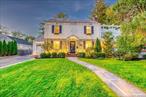 Welcome to this much sought after Rockville Centre, Greystone Section Center Hall Colonial. This 3 Bedroom Home boasts old world charm combined with updated and Custom Finishes. It all starts with Curb Appeal, the meticulously landscaped 8000 Square Foot property with Beautiful Landscape Lighting featuring 4 Car Driveway with an Attached 1 Car Garage, a slate walkway leads to a Fieldstone Front Facade, White Siding with Black Shutters, Grid Windows and a Slate Roof. The fabulous Main Level Foyer leads to your Formal Dining Room with Chair Rail & Dental Crown Molding off your Updated Kitchen with Wood Cabinets, Tin Backsplash, Granite CounterTops, Stainless Steel Appliances and a Breakfast Bar. You also have a Half Bathroom, a Formal Living Room with a Wood Burning Fireplace and Coffered Ceiling off of a Sunlit Den with Wrap-around Windows and access to your private yard, all with Gleaming Hardwood Floors Throughout. The Second Level Consists of a 15x15 Primary Bedroom with 2 Large Closets, a Full Bathroom, 2 Additional Bedrooms and a 14x20 Private Roof Top Sun Deck which can be enclosed to provide more living space. This Home Sits On An Oversized Property with a Tree Lined Park-like Yard, a Large Wood Deck, Pergola and a Privacy Fence and Could Easily Fit A Pool. This Home Also Boasts a Basement with High Ceilings, Steel I-Beam Construction & Block Foundation.Rockville Centre offers a vibrant, urban-meets-suburban lifestyle with a boasts a vibrant downtown area filled with restaurants, bars, and shops, offering a dynamic atmosphere. From classic pub fare to high-end Italian and seafood, the dining scene is diverse and satisfying. The Oceanside Union Free School District is highly regarded, attracting people for its academic excellence and diverse programs. Outdoor recreation, including Hempstead Lake State Park Situated on the west side of town, the park provides opportunities for fishing, hiking, tennis, and horseback riding. Several Long Island nearby beaches Long Beach, Jones Beach, and Lido Beach are all a short distance away, making for easy summer getaways. The village also provides various activities, entertainment at the Madison Theatre and strong sense of community through events residents can enjoy like the Parades, summer concerts, and holiday festivals that foster a close-knit feel. The Rockville Centre Recreation Center offers sports programs, fitness facilities, an indoor track, and other services. All of this and convenient access to New York City.