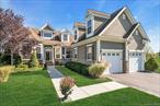 Northfork living at its best! Welcome to the prestigious Highland Club of Aquebogue where this Addison Model has stunning panoramic views of Long Island. . Privacy abounds in this 3 bedroom, 2.5 bath post-modern beauty. With plenty of curb appeal, you ascend the porch and enter the home to be greeted by hardwood floors and soaring ceilings. The entry hall features a coat closet and half bath (so pretty), and then leads you to the home office tucked in a private corner of the house. The great room is the center of the home with 2 story ceiling, fabulous windows and sliding door, and a stone wood burning fireplace as the centerpiece of the room! Quite the entertainment space. The formal dining room sits at the from of the home and can seat 12-14 comfortably. The kitchen features custom wood cabinets and being that this is a gas house there is a gas stove! The views from the kitchen table are breathtaking overlooking the beautiful pond. The primary bedroom features a trayed ceiling and picture window. There are 2 walk-in-closets and another regular closet. Plenty of closets! The ensuite bathroom features a soaking tub, a separate shower and double vanity. Wait! There&rsquo;s more! The full basement is partially finished with a pool table area and family room. Then you open the door to the rest of the basement and your shocked to see how big it really is! Plenty of room to make it everything you want. Relax on the patio by the firepit in the privacy that surrounds you. The views are amazing. You will fall in love! New Microwave, W&D 6 years, 200 AMP, EV CHARGER.
