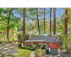 Enjoy private, direct lakefront access and stunning views from this chic 3-bedroom, 2.5-bathroom modern, turnkey dream cabin on lovely Jones Pond! With stylish Mid-century modern designer features and thoughtful updates throughout, 48 David offers an elevated escape, plenty of room for guests, amazing outdoor spaces, and year-round comfort. The sleek open-concept kitchen features smart storage and an ultra-deluxe Hestan gas range that will wow any chef or guest. The living room room offers a cozy fireplace and snazzy custom built-ins--all opening to a spectacular deck overlooking the pond, a truly magnificent setting for outdoor dining, relaxation, and entertaining. Watch movies in the den, fire up the sound system, putter in the veggie garden, work out in the finished basementâ€™s gym/rec room, paddle or swim in the pond, or hit the Blackberry Pond Loop trail just across the street for a hike. The spacious first-floor primary suite features cathedral ceilings, en suite dual-sink bathroom, walk-in closet, wood-burning stove and juliette balcony. Upstairs, find two more bedrooms with views, and another dual-sink full bath. A cedar closet in the lower level houses your off-season garments & you&rsquo;ll find extra pantry/storage space is plentiful. Modern comforts abound, with a generator for peace of mind, attached garage, and efficient ductless cooling/heating and radiant heat. Lakefront living, just ten minutes from the MetroNorth train to NYC and the charming Village of Pawling!