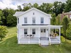 Rare are the days when houses like this come along; a truly move in-ready, quintessential Victorian with modern conveniences and timeless aesthetics. The c.1890 Riverview House showcases the intrinsic sophistication of a Victorian without the fussiness, and boasts all the things: 2, 700+ sq ft, 4 bedrooms, 2 large full baths, a pool, a writing studio - all set on 1â€“acre edged by mature trees. The house itself feels like a breath of fresh air; think natural light, high ceilings, a showstopping staircase and ornate, original front door, well-sized common spaces and four bedrooms (including a first floor primary), all with thoughtful historical details. Thereâ€™s a large eat-in kitchen and dining room with seating for more than 10, and a sunny living room perfect for watching the boats go by. Catch a cocktail on the deep, storybook front porch, write your next novel in the detached studio, lounge by the pool.All of the heavy lifting has been done for you; with its new roof, generac generator, well maintained mechanicals and fresh paint inside and out, this is a house that checks all the boxes; modern updates, old school charm, and natural light so extraordinary, sunsets feel as if they were painted by Hudson River School artists. The Riverview House bookends a friendly street of equally lovely, well cared-for homes with generous off-street parking. The tightly-knit hamlet of Stuyvesant also offers a nearby boat launch, a sandy beach, countless hiking trails, nearby farm stands, distilleries, and so much good ice cream. The north county location cannot be beat-15 minutes to Hudson, 15 minutes to Kinderhook, a short drive to creature comforts in Albany and just over two hours from Midtown.
