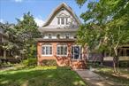 Please note Open House is by appt only.Rare Beauty Meticulously maintained, 1910 Victorian with 5 Beds, 3.5 + Baths and detached Garage/Studio set on a 50&rsquo; x 105&rsquo; lot sited on a beautiful tree-line cul-de-sac in landmarked Fiske Terrace-Midwood Park. Over 3, 500 sq ft of flexible living space spread over 4 floors. Generously sized light filled rooms, original craftsman detailing, woodwork and marquetry inlayed floors throughout. First Floor. Enclosed and heated Sun-Room (full house width) with panoramic casement windows. Entry Foyer and coat room. Central formal Parlor Room with arched brick fireplace. Adjacent, generous Sitting Room. Stair Hall with grand winding banister staircase with original stained-glass windows. Gracious, oversized dining room with Arts & Crafts fireplace, pocket and butler doors for privacy. Enormous eat-in Kitchen with true professional set up including a 60â€ Garland gas range, salamander oven and commercial hood, expansive countertop and prep space, central fridge, generous cabinets and pantry space. Half bath with window located discreetly off the Kitchen. Garden & Garage Studio. French doors from the Kitchen lead to a private fenced in backyard with brick patio. The detached garage (approx. 320 sq ft) has been converted into a fully climatized modern studio with kitchenette (stylish sink & cabinetry, but no appliances). Custom French glass doors lead out to private fenced in driveway court space. Second Floor. Two spacious light filled Second Bedrooms with bay window seats, walk-in closets, with one having an adjoining washroom and linen cupboard. Oversized Primary with adjoining bright Sunroom (full house width) with large walk-in closet area. Oversized bathroom with separate deep shower, bathtub alcove with stained glass window and hip bath. Stair hall with linen closet. Third Floor. Studio-sized Bedroom with sitting area. Large Second Bedroom with window alcove for a king sized bed and deep closet. Magazine worthy remodeled bathroom with soaking tub, custom exposed rain shower. Large stair hall landing. Cellar. Fully renovated, insulated and climatized with windows throughout. Media Play Room with additional sound insulation. Separate Gym area. Massive Laundry room with full size machines and adjacent walk-in storage. Separate large capacity Storeroom. Back side door and stair. Noteworthy / Upgrades. Split system air-conditioning throughout. Efficient and upgraded steam boiler with fully restored radiators. Large capacity hot water heater. Unfinished attic space with inspiring potential. Recessed lighting on dimmer switches. Private driveway with room for four cars.Location. Two blocks from the Q and Express B trains at Newkirk Plaza (24 minutes to Manhattan). Convenient to retail and shops. Moments from Cortelyou Roadâ€™s vibrant restaurants & caf&#233;s. Historic Fisk Terrace, built between 1905 and 1914, is uniquely special in the city owing to its individual custom-built houses.