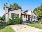 This well-maintained two-family side-by-side duplex, built in 1983, is ideally located on a quiet street in Port Washington. Set on a 54 x 100 lot, each unit offers 2 bedrooms and 2.5 baths with a thoughtfully designed layout. The first floor features a spacious living room with cathedral ceilings and a wood-burning fireplace, a formal dining room with access to a large deck, and a bright kitchen alongside a powder room. Upstairs, the primary bedroom boasts vaulted ceilings, complemented by an additional bedroom and full hall bath. Beautiful hardwood floors run throughout the first and second levels. Each unit also includes a full finished basement with laundry, utilities, and ample storage. Roof - 4 yrs old. Unit B has been fully renovated with a modern kitchen, updated appliances, and newly finished baths. Additional updates include a 5-year-old boiler, two newer A/C units (2 years old), fresh paint, and refinished hardwood floors. Perfectly situated close to parks, town, shops, restaurants, and the LIRR, this property offers both strong rental potential and long-term value.