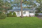 Charming ranch located in the desirable waterfront community of Waters Edge in Flanders. This inviting home offers 2â€“3 bedrooms and 1 full bathroom on a .22-acre lot, providing the perfect opportunity for year-round living or a Hamptons getaway. The bright and open layout features a comfortable living area, updated kitchen with granite counters and stainless-steel appliances, dining room with sliders out to the Trex deck, and flexible space that can serve as a third bedroom, home office, or den. Enjoy the peaceful setting of this established community with access to nearby beaches, boating, and all the East End has to offer. A great value with endless potential to make it your own.All offers need to be pre-qualified by Justin Greenberg RCG Mortgage, jgreenberg@rcgmortgage.com-917-951-9580