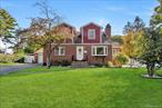 Welcome to this inviting brick and siding Cape-style home, complete with oversized dormers and a generous yard. Lovingly cared for by the current owners, every detail reflects thoughtfulness, comfort, and pride of ownership.The bright and open living room offers gleaming hardwood floors, a cozy fireplace, custom built-in shelving, and a charming bay window that floods the space with natural light. The open concept to the dining area and kitchen creates a seamless flowâ€”ideal for gatherings, entertaining, or everyday living.The kitchen, filled with sunlight, is the perfect spot for family meals and conversation. From there, step into a beautiful four-season room featuring vaulted ceilings, hardwood floors, and expansive corner windows that frame serene views of nature. This versatile space makes a perfect reading nook, sitting room, or casual lounge. The main level also includes a convenient half bathroom and a comfortable primary bedroom with excellent storage. The en-suite bath offers a jetted corner tub surrounded by custom tileâ€”an inviting retreat after a long day.Upstairs, a neutral carpeted staircase leads to three additional bedrooms, each spacious and bright with hardwood floors, sloped ceilings, and skylights that add character and charm.The lower level provides even more living potential, with laundry, storage, and flexible recreational space not included in the listed square footageâ€”ideal for hobbies, a home gym, or a playroom. Step outside to your private backyard oasis. A patio, pool, and wide-open yard make it perfect for summer relaxation and entertaining.Located just minutes from shopping, colleges, dining, medical facilities, the Poughkeepsie waterfront, and Metro-North, this home blends convenience with comfort. Donâ€™t miss your chance!