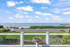 Welcome to spectacular sunsets and 180-degree water views of Long Island Sound from one of the most sought-after streets in Bayville. Mohring Bay Court is a private waterfront street with private beach and proximity to stores and restaurants. This beautiful home offers approximately 2500 sq-ft of modern living with high ceilings, 3 bedrooms, 2.5 baths, natural gas heat, CAC, CVAC, 2nd-floor laundry, finished basement, 2-car heated garage with Tek System, and gas whole house generator. Situated on over 1/3 acre, this residence boasts a vinyl inground heated salt-water pool, hot tub, large front porch, huge rear deck and patio, outdoor granite kitchen with natural gas grill, plus a large shed. Enjoy panoramic water views from every window, and the Primary Suite features an en-suite bath and a coveted private balcony overlooking the Sound. Locust Valley schools, taxes under $18k. NOT IN A FLOOD ZONE!