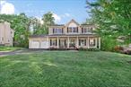 This stunning New Windsor Colonial is perfectly situated on a 1-acre lot in the sought-after Windsor Woods subdivision. Backing up to woods, this property enjoys a peaceful backdrop of protected green space that will remain undeveloped. This home offers wonderful curb appeal with its inviting front porch with swing and paver walkway, all in a highly desirable neighborhood that blends natural beauty, community, and convenience. A warm, welcoming entryway leading to a living room with barn doors, ideal as a private office or den. The spacious kitchen has been beautifully refreshed with quartz countertops, pantry and stainless appliances, flowing seamlessly into the family room featuring a gas fireplace and triple windows overlooking views of the wooded backyard. Enjoy outdoor living on the deck and patio, the perfect setting for entertaining or relaxing in the private backyard. Upstairs, the primary suite offers a walk-in closet and large ensuite bath with double sinks, whirlpool tub, and separate shower. Three additional bedrooms and 2nd full Bath provide ample space for family or guests. The full unfinished walk-out basement with sliders and full windows to patio overlooks the backyard, offering endless potential for future living space, multigenerational use, or recreation. Additional highlights include a freshly painted interior, energy efficient dual central air, attached 2-car garage interior painted with newer garage doors, and all municipal services. Perfectly located for commuters â€” less than 10 minutes to I-84 and Thruway, and 5 minutes to the Salisbury Mills Train Station â€” easy access to West Point and Woodbury Commons. This Hudson Valley home truly combines comfort, style, and convenience.