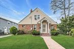 A Charming In line Brick Cape-Cod featuring Main Floor Primary Bedroom with a Ductless Air System, 2 1/2 Bathrooms, Eat-in-Kitchen, True Formal Dining, Large Living room with Wood Burning Fireplace! Two Bedrooms (no Slanted ceilings!) and a Full Bathroom Upstairs. Full Basement, Partially Finished with Outside Entrance! Gas Cooking, Butler Pantry in Dining room, Some Hardwood Floors, Nice Rear Patio, Over-sized Property with Two Car Detached Garage and Carport. Lots of Off Street Parking. Low Taxes! Donâ€™t Miss Your Chance!